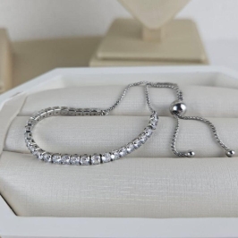 PULSEIRA  BANHO DE RODIO COM PEDRAS  E FECHO GRAVATA