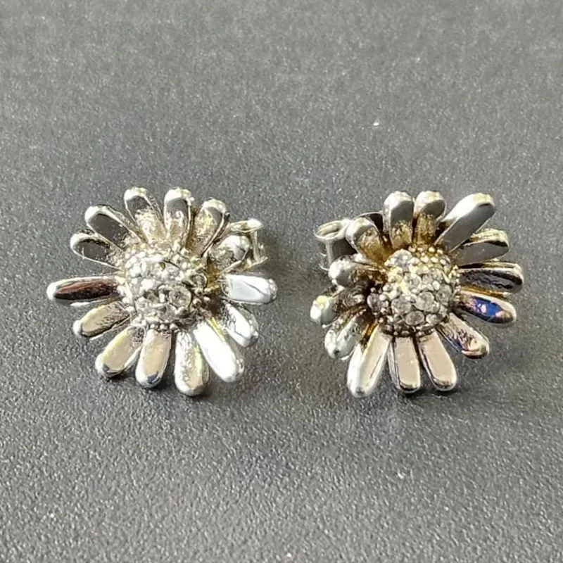 BRINCO FLOR GIRASSOL CRAVEJADO