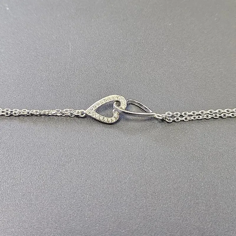 PULSEIRA ELO DUPLO DOIS CORAÇÕES  CRAVEJADO E VAZADO