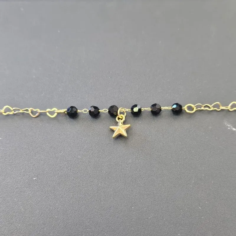 PULSEIRA ELO LOVE PEDRAS PRETAS COM ESTRELA PENDURADA