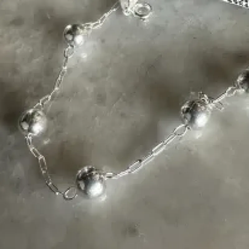 PULSEIRA PRATA BOLA ELO CARTIER
