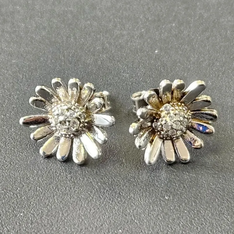 BRINCO FLOR GIRASSOL CRAVEJADO