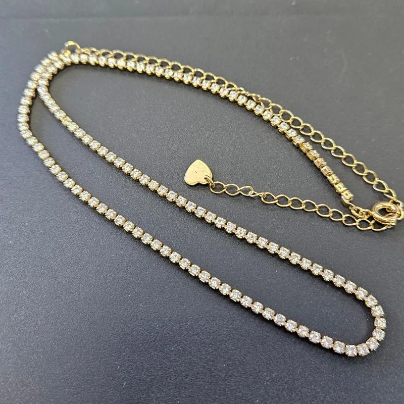 CHOCKER RIVIERA 32 CM COM 15 CM DE EXTENSOR CORAÇÃO LISO NA PONTA.