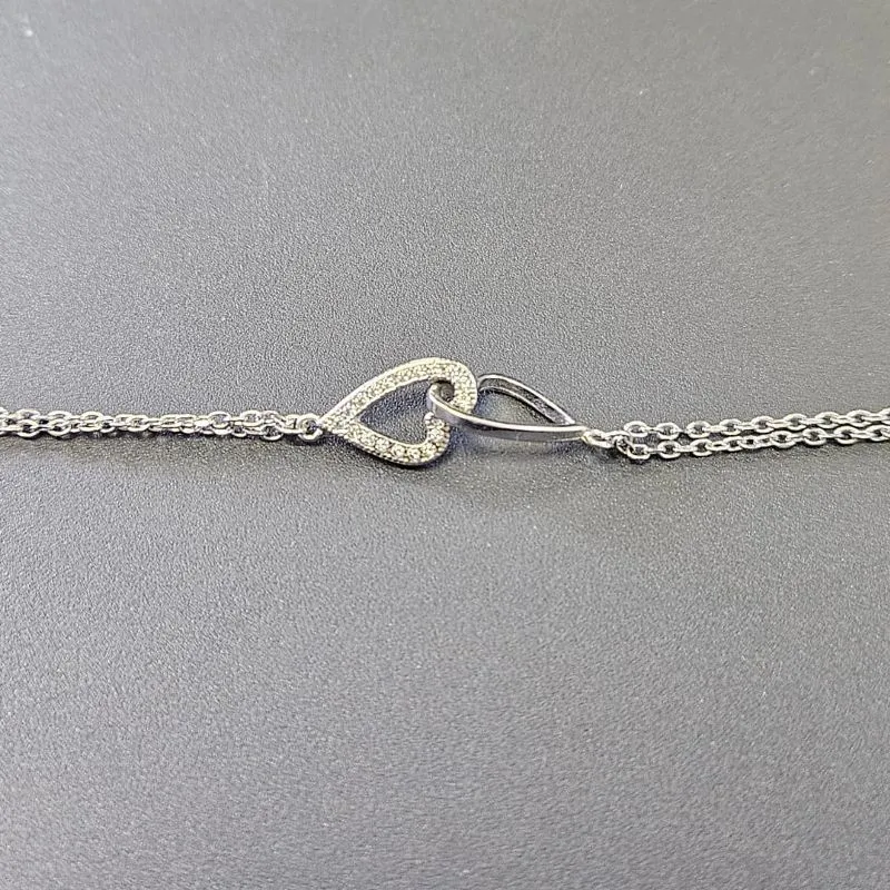 PULSEIRA ELO DUPLO DOIS CORAÇÕES  CRAVEJADO E VAZADO